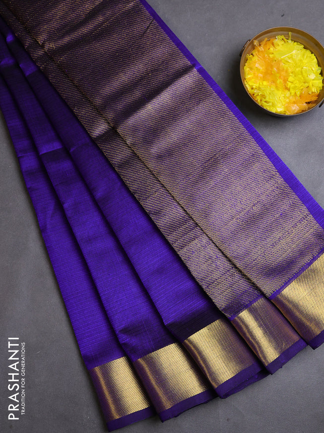 Silk cotton saree blue with plain body and zari woven border