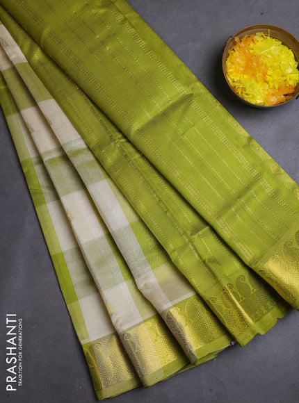 Silk cotton saree off white and light green with allover paalum pazhamum checks & buttas and zari woven border