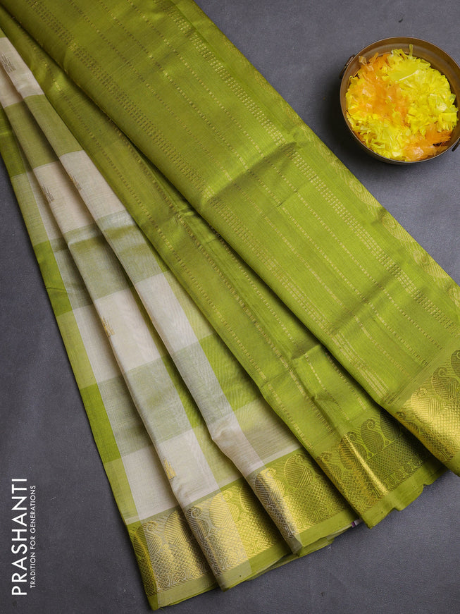 Silk cotton saree off white and light green with allover paalum pazhamum checks & buttas and zari woven border