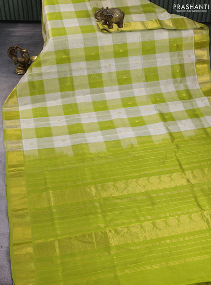 Silk cotton saree off white and light green with allover paalum pazhamum checks & buttas and zari woven border