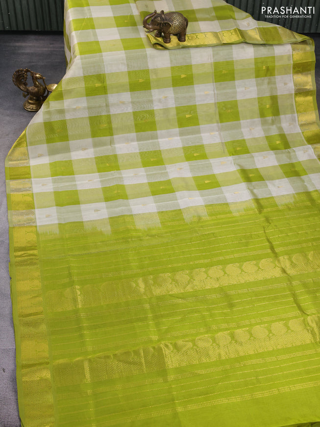 Silk cotton saree off white and light green with allover paalum pazhamum checks & buttas and zari woven border