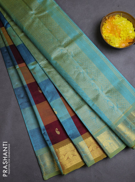 Silk cotton saree multi colour and teal blue with allover paalum pazhamum checks & buttas and zari woven border