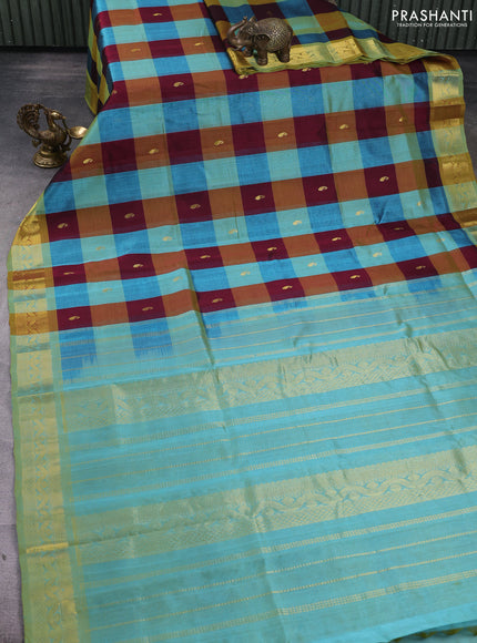 Silk cotton saree multi colour and teal blue with allover paalum pazhamum checks & buttas and zari woven border