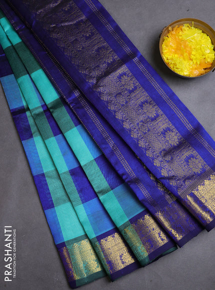 Silk cotton saree teal blue and blue with allover paalum pazhamum checks & buttas and zari woven border