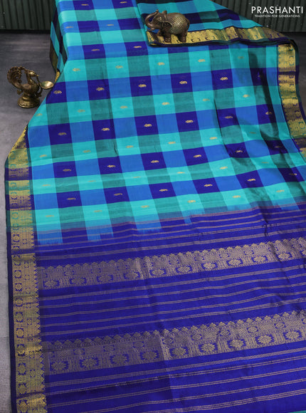 Silk cotton saree teal blue and blue with allover paalum pazhamum checks & buttas and zari woven border
