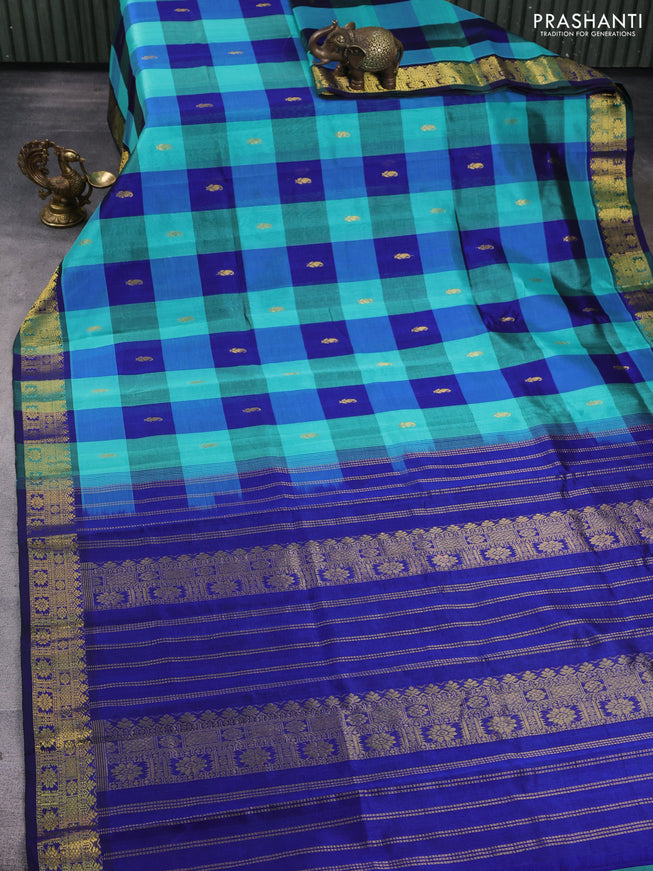 Silk cotton saree teal blue and blue with allover paalum pazhamum checks & buttas and zari woven border