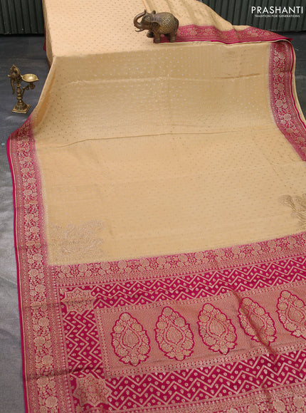 Pure banarasi georgette saree sandal and pink with woven buttas and woven border