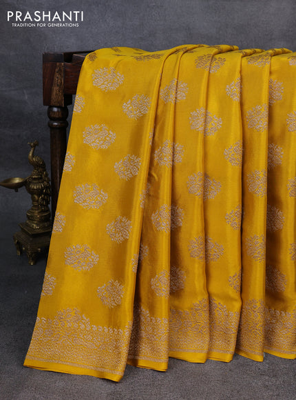 Pure banarasi georgette saree yellow with woven buttas and woven border