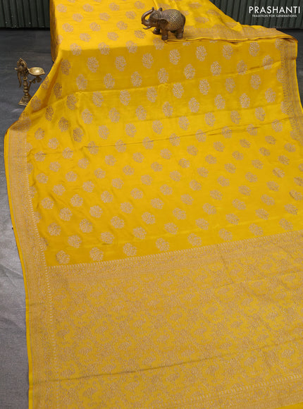 Pure banarasi georgette saree yellow with woven buttas and woven border