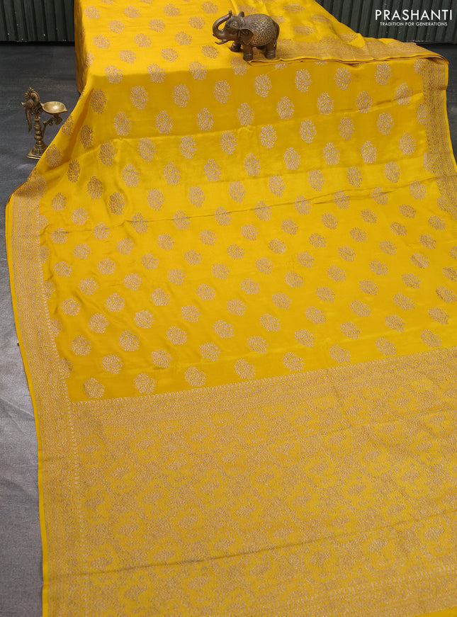 Pure banarasi georgette saree yellow with woven buttas and woven border