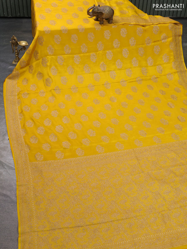 Pure banarasi georgette saree yellow with woven buttas and woven border