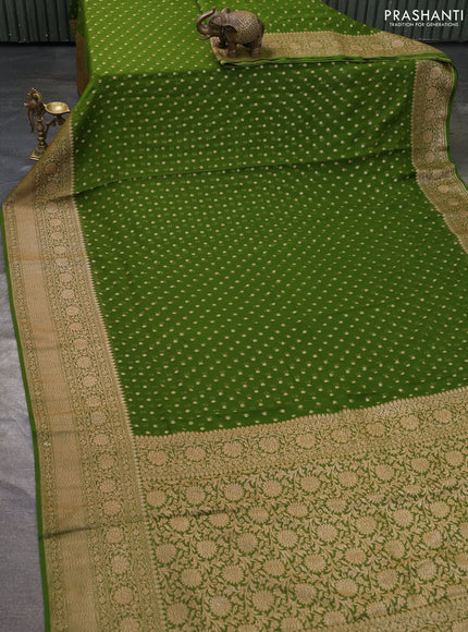 Pure banarasi georgette saree light green with woven buttas and woven border