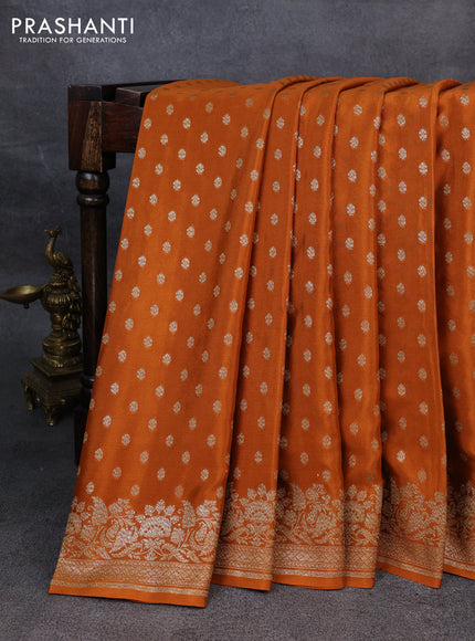 Pure banarasi georgette saree orange with woven buttas and woven border
