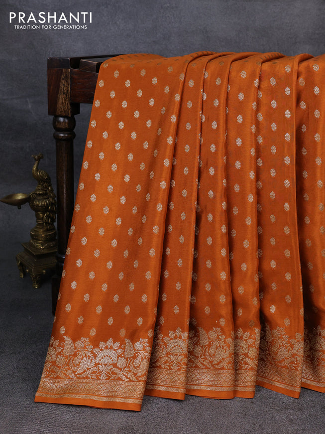 Pure banarasi georgette saree orange with woven buttas and woven border