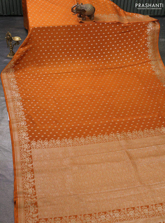 Pure banarasi georgette saree orange with woven buttas and woven border