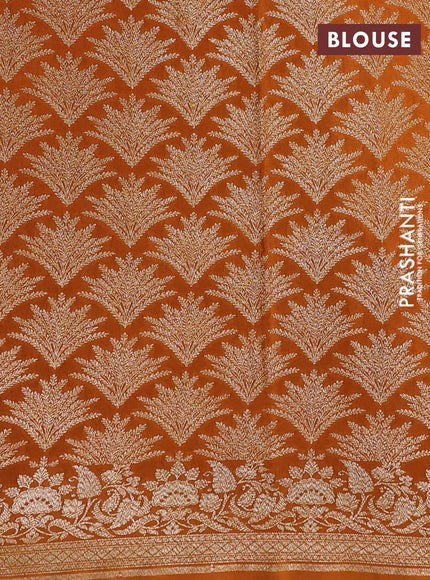Pure banarasi georgette saree orange with woven buttas and woven border