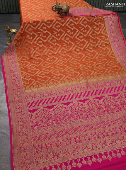 Pure banarasi georgette saree orange and pink with allover thread & zari weaves and woven border