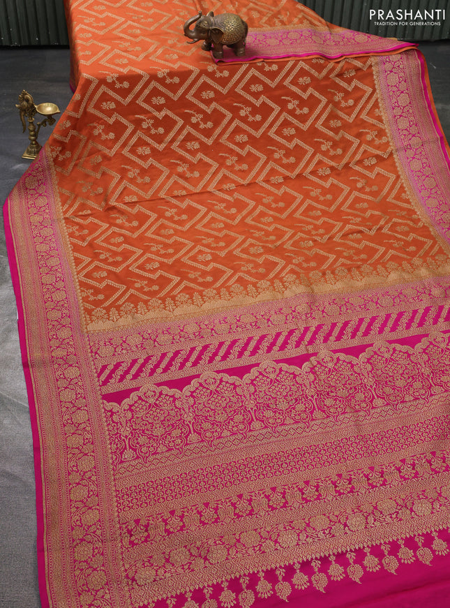 Pure banarasi georgette saree orange and pink with allover thread & zari weaves and woven border