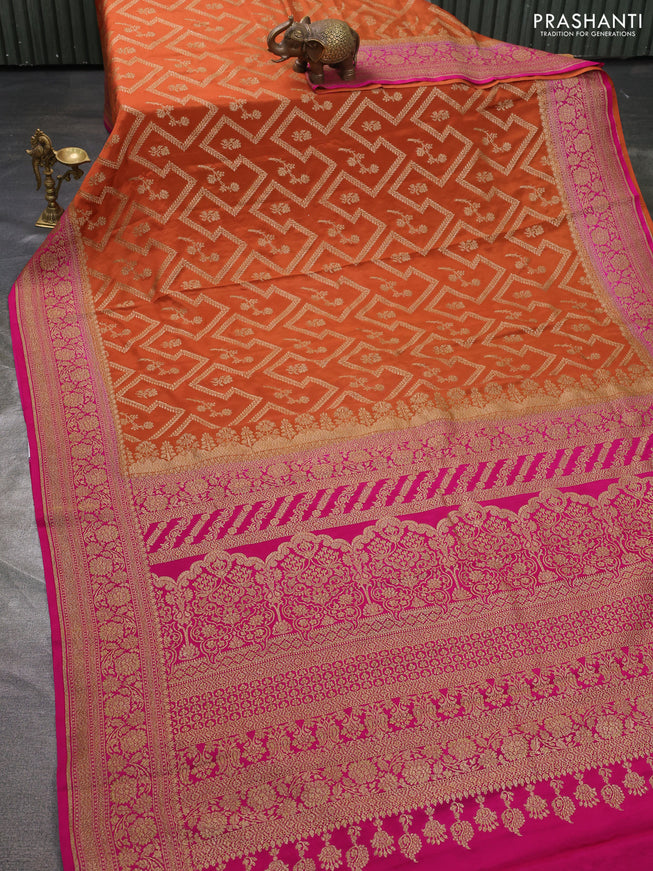 Pure banarasi georgette saree orange and pink with allover thread & zari weaves and woven border