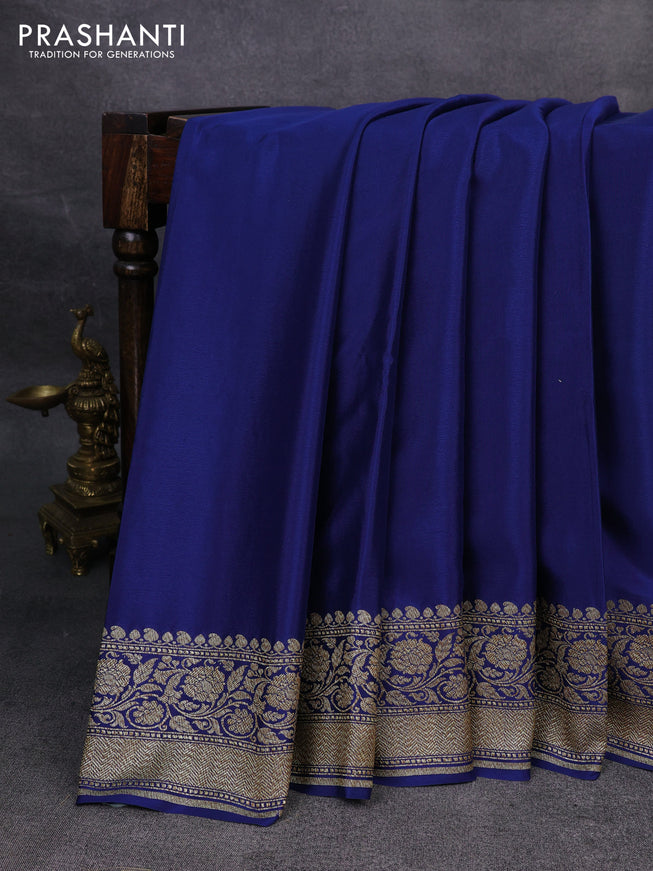 Pure banarasi georgette saree cs blue with plain body and woven border