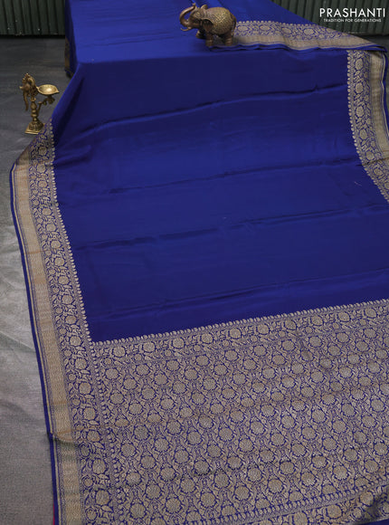 Pure banarasi georgette saree cs blue with plain body and woven border