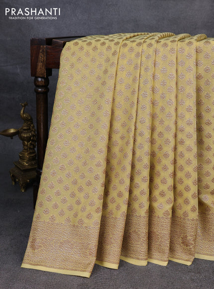 Pure banarasi georgette saree pale yellow with woven buttas and woven border