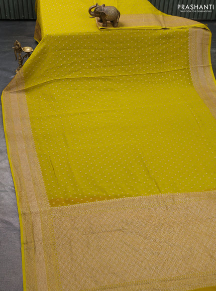 Pure banarasi georgette saree lime green with woven buttas and woven border