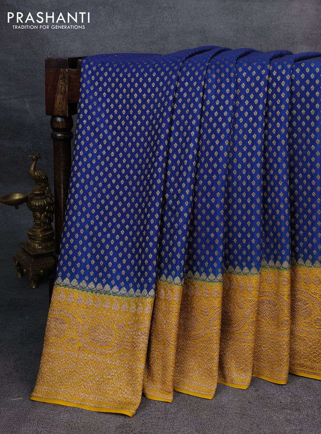 Pure banarasi georgette saree blue and yellow with woven buttas and woven border