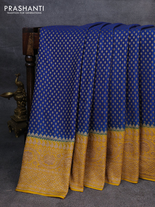 Pure banarasi georgette saree blue and yellow with woven buttas and woven border