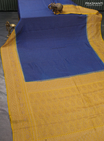 Pure banarasi georgette saree blue and yellow with woven buttas and woven border