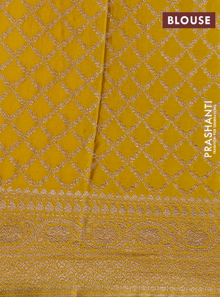 Pure banarasi georgette saree blue and yellow with woven buttas and woven border