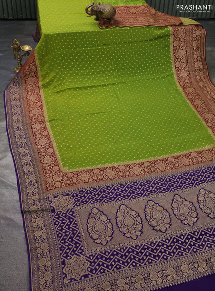 Pure banarasi georgette saree light green and maroon blue with woven buttas and woven border