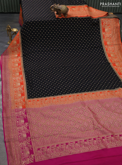 Pure banarasi georgette saree black and orange pink with woven buttas and woven border