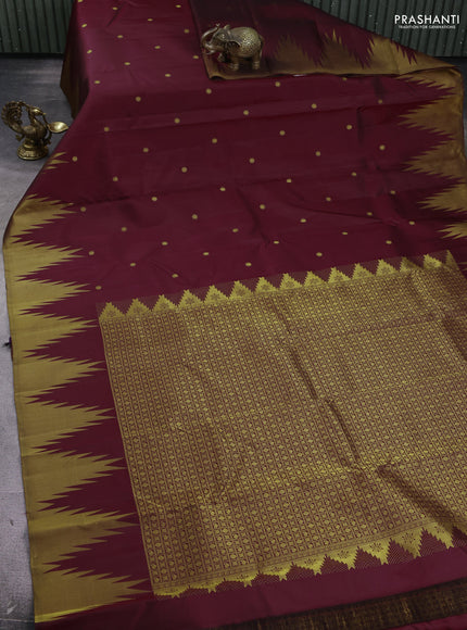 Pure kanchipuram silk saree maroon with zari woven buttas and temple design zari woven border