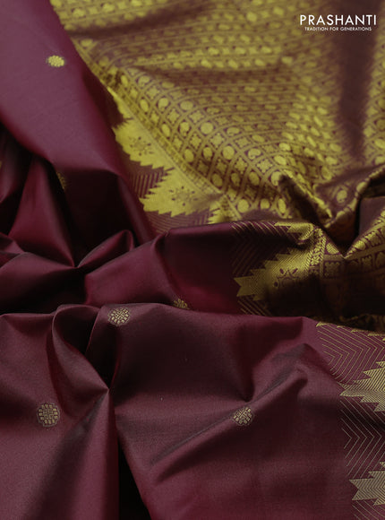 Pure kanchipuram silk saree maroon with zari woven buttas and temple design zari woven border