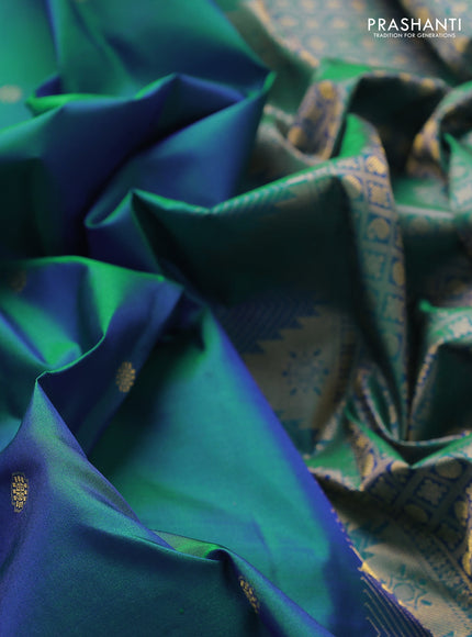 Pure kanchipuram silk saree dual shade of cs blue with zari woven buttas and temple design zari woven border