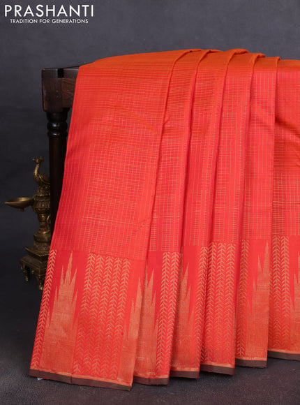 Pure kanchipuram silk saree dual shade of pinkish orange with allover zari checked pattern and temple zari woven border