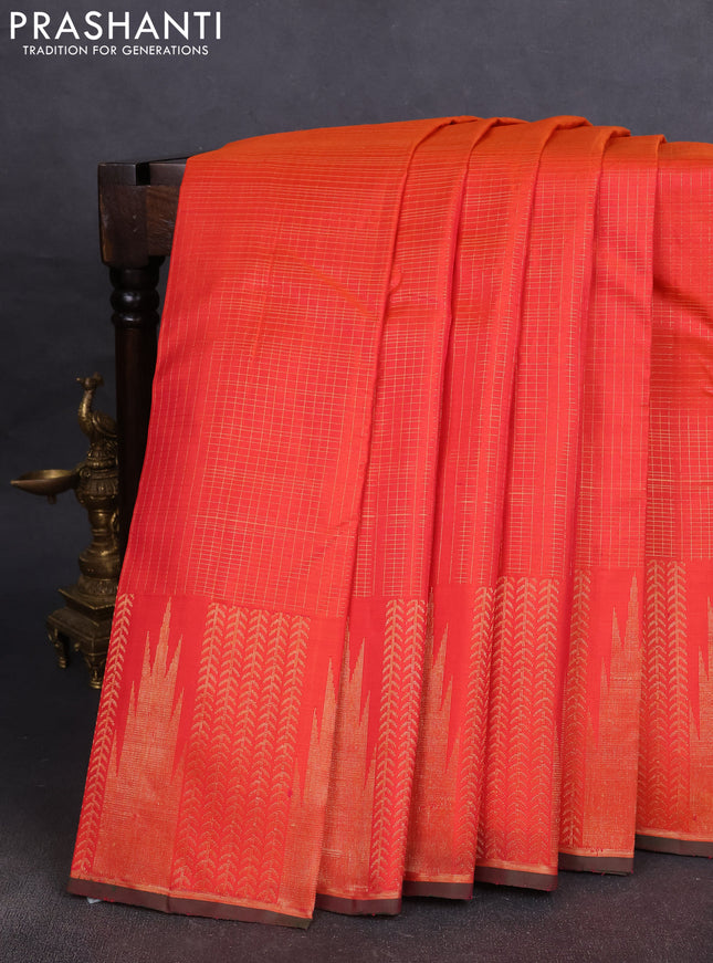 Pure kanchipuram silk saree dual shade of pinkish orange with allover zari checked pattern and temple zari woven border