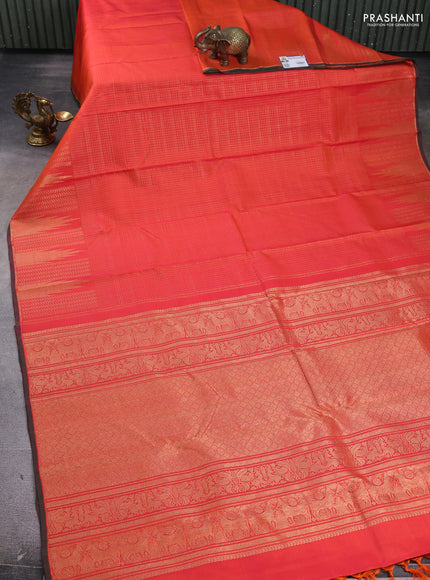 Pure kanchipuram silk saree dual shade of pinkish orange with allover zari checked pattern and temple zari woven border