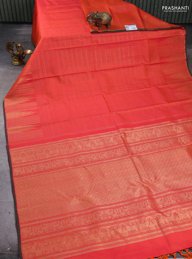 Pure kanchipuram silk saree dual shade of pinkish orange with allover zari checked pattern and temple zari woven border