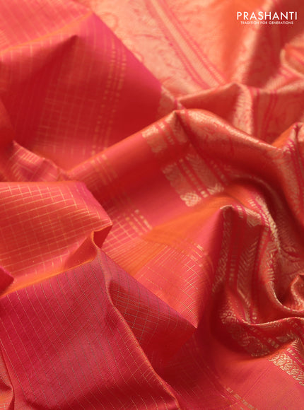 Pure kanchipuram silk saree dual shade of pinkish orange with allover zari checked pattern and temple zari woven border
