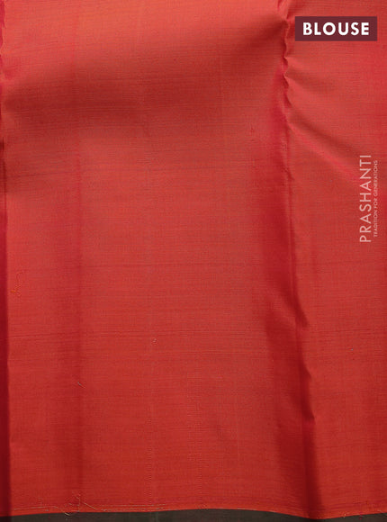 Pure kanchipuram silk saree dual shade of pinkish orange with allover zari checked pattern and temple zari woven border