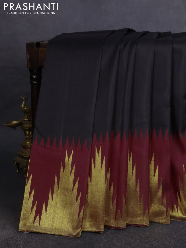 Pure kanchipuram silk saree black and maroon with plain body and temple zari woven border