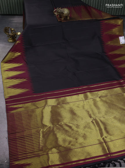 Pure kanchipuram silk saree black and maroon with plain body and temple zari woven border