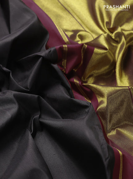 Pure kanchipuram silk saree black and maroon with plain body and temple zari woven border
