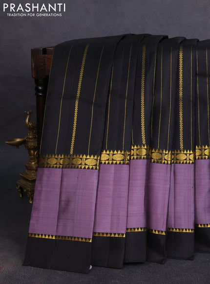 Pure kanchipuram silk saree black and pastel lavender with allover zari weaves and rettapet zari woven border