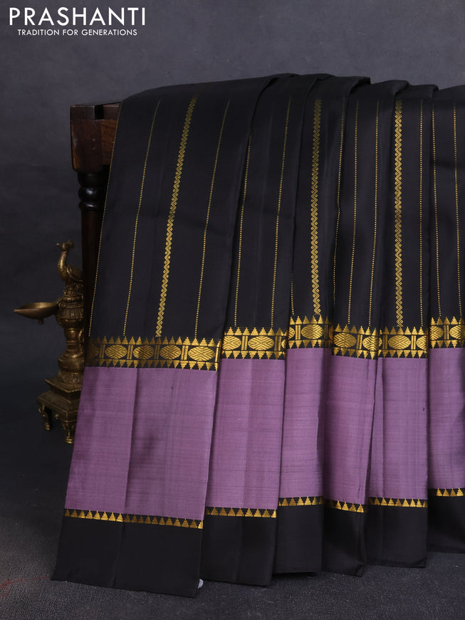 Pure kanchipuram silk saree black and pastel lavender with allover zari weaves and rettapet zari woven border