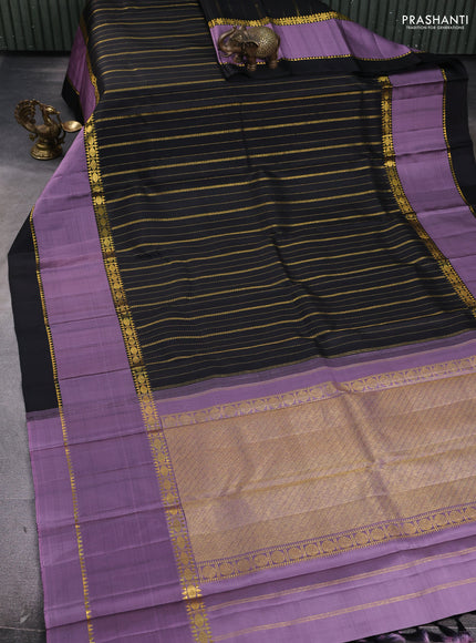 Pure kanchipuram silk saree black and pastel lavender with allover zari weaves and rettapet zari woven border