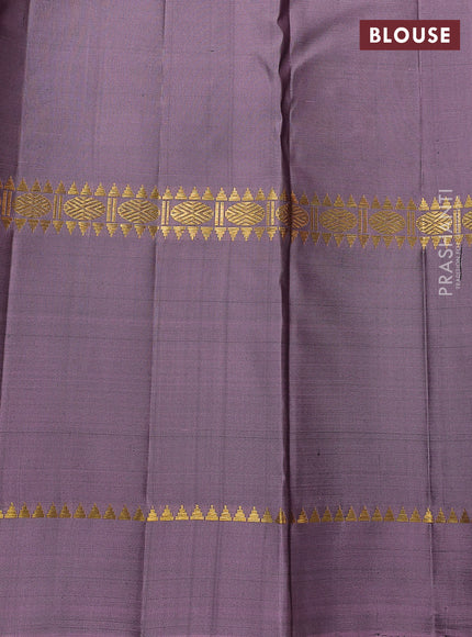 Pure kanchipuram silk saree black and pastel lavender with allover zari weaves and rettapet zari woven border