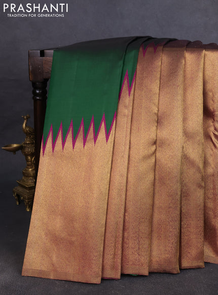Pure kanchipuram silk saree green and purple with plain body and rising border